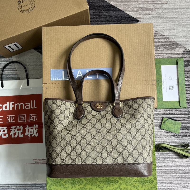 G*u*i shopping bags